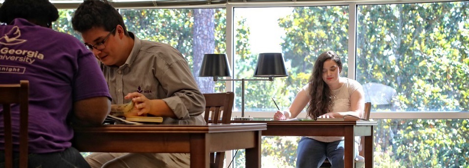 Students study on the second floor of the Macon library.